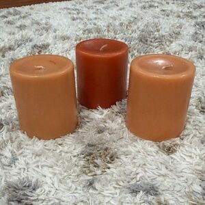 Set of Three Orange and Tan Pillar Candles